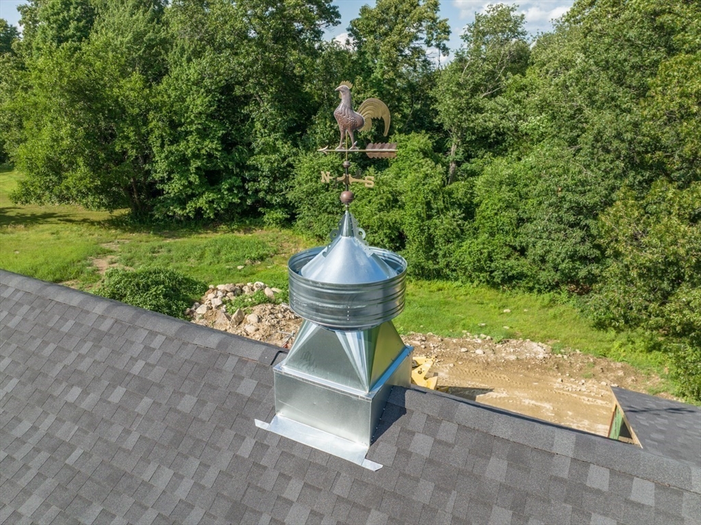 Lot 4 Pickering Road Blackstone, MA 01504 - Photo 19 of 19 a view of a fountain in a yard next to a road