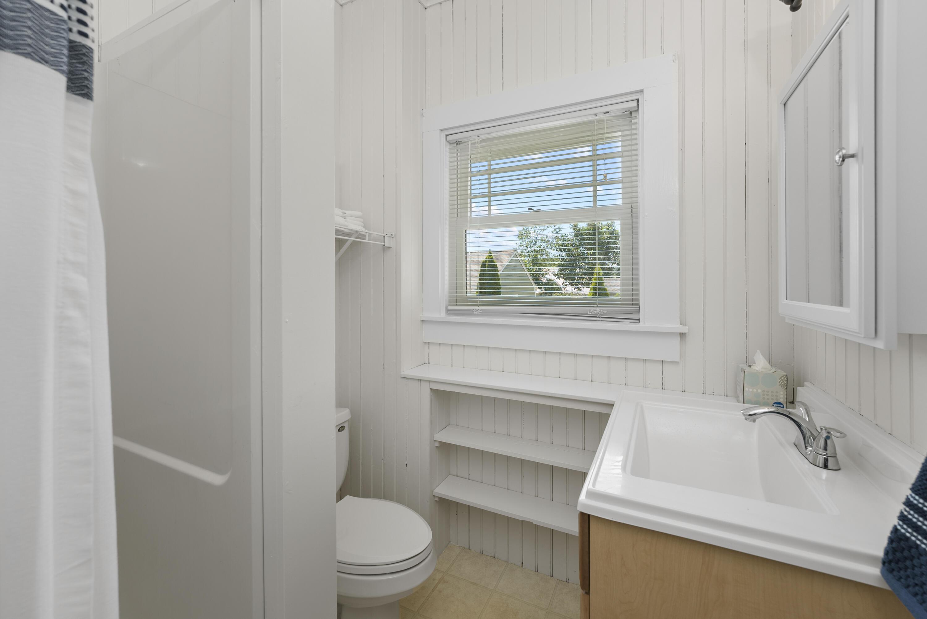 101 Rendezvous Lane Barnstable, MA 02630 - Photo 27 of 33 a bathroom with a sink toilet and window