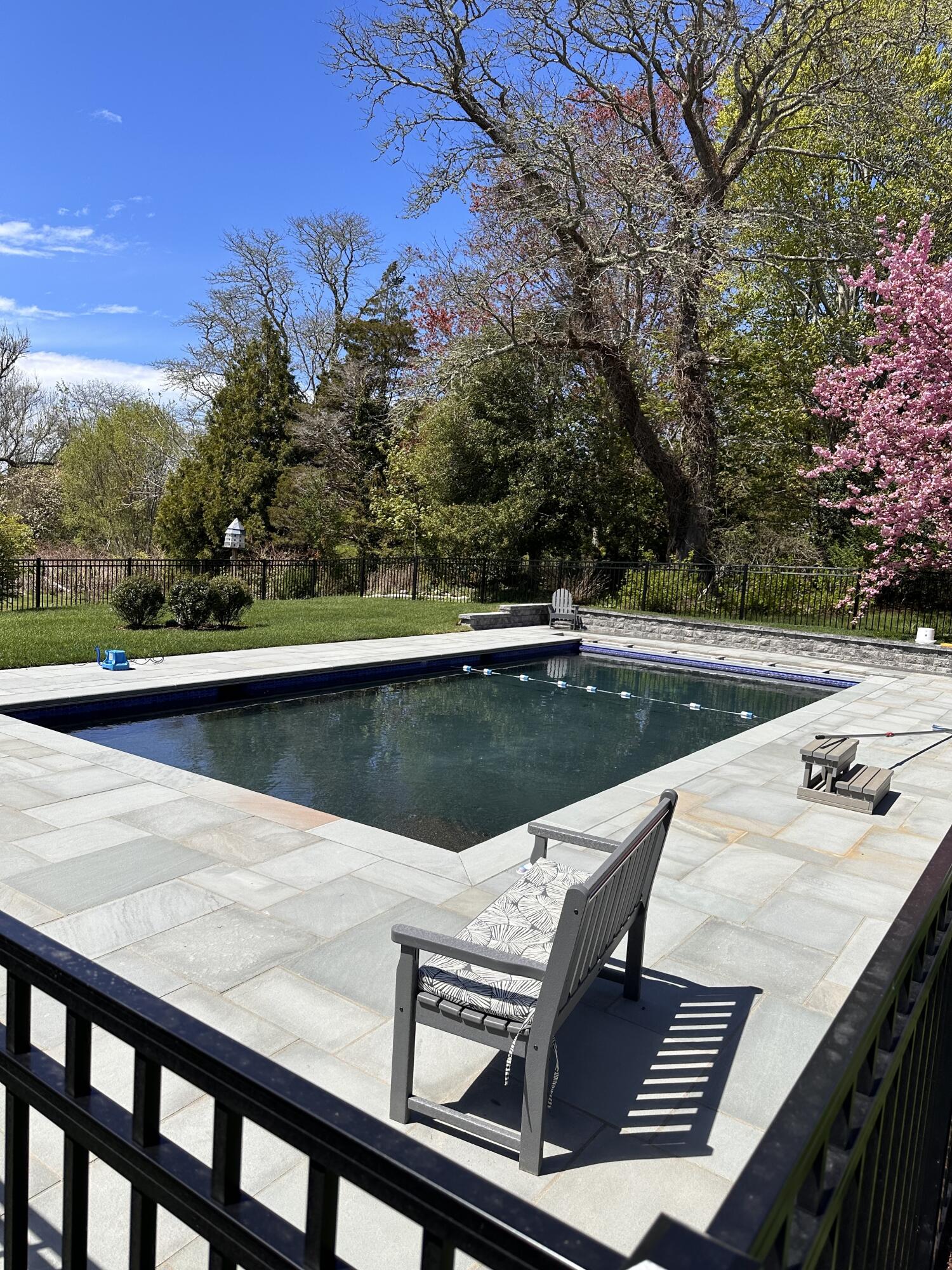 101 Rendezvous Lane Barnstable, MA 02630 - Photo 29 of 33 a view of a swimming pool with a yard