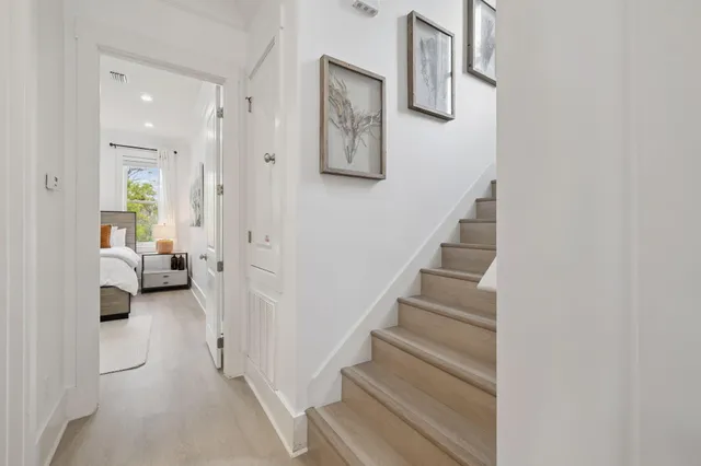 a view of a livingroom with furniture and a flat screen tv