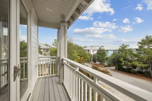 a view of a back yard from a balcony