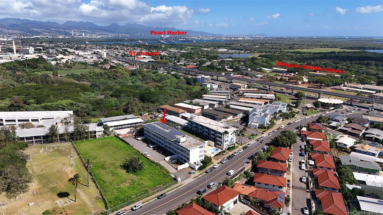 94-249 Waikele Road, Unit A307 Waipahu, HI 96797 - Photo 20 of 20 an aerial view of residential houses with outdoor space