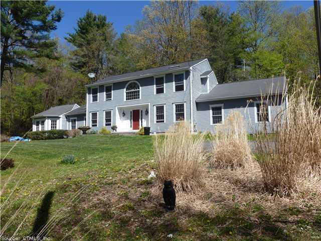 57 Indian Hill Road Canton, CT 06019 - Photo 1 of 1 a front view of a house with a yard