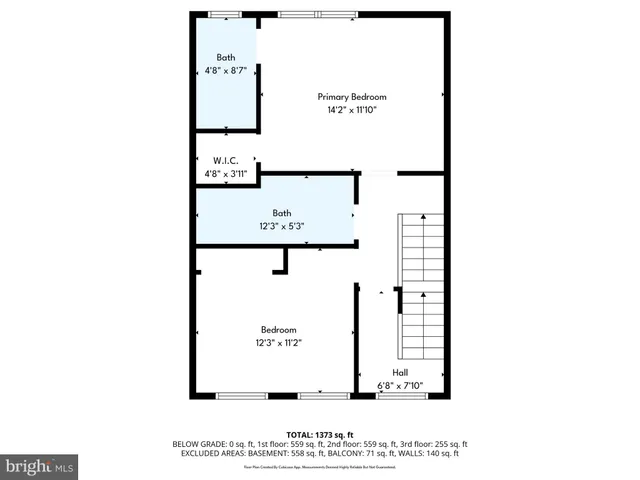 a picture of a bench in front of a wall