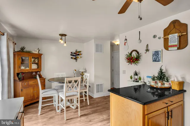a table and chairs in a kitchen