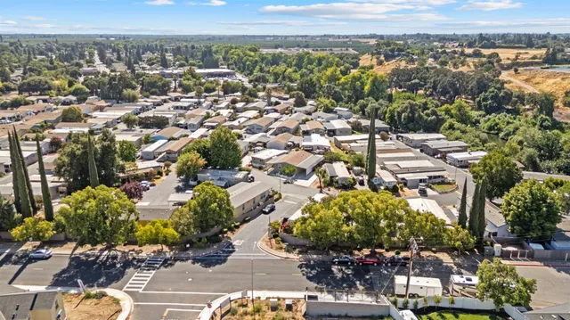 an aerial view of a city with lots of residential buildings