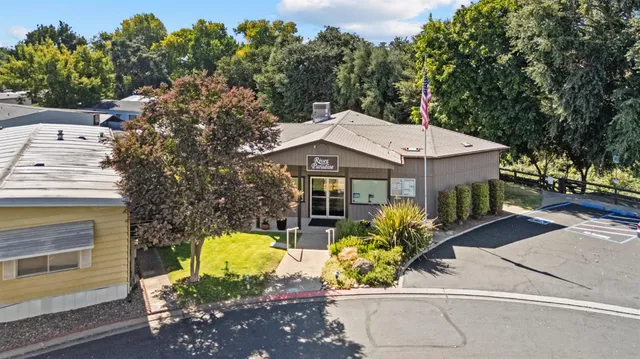 a patio with table and chairs