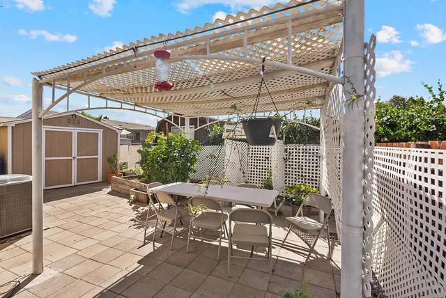 an aerial view of a house with a swimming pool