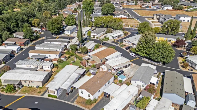 an aerial view of a city with lots of residential buildings