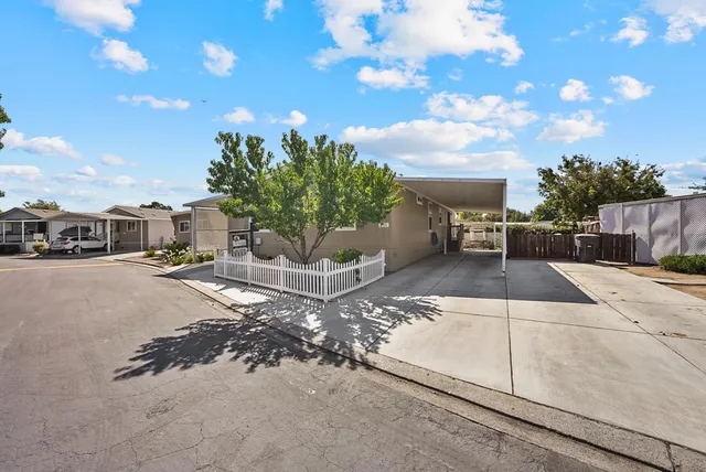 a living room with furniture and window