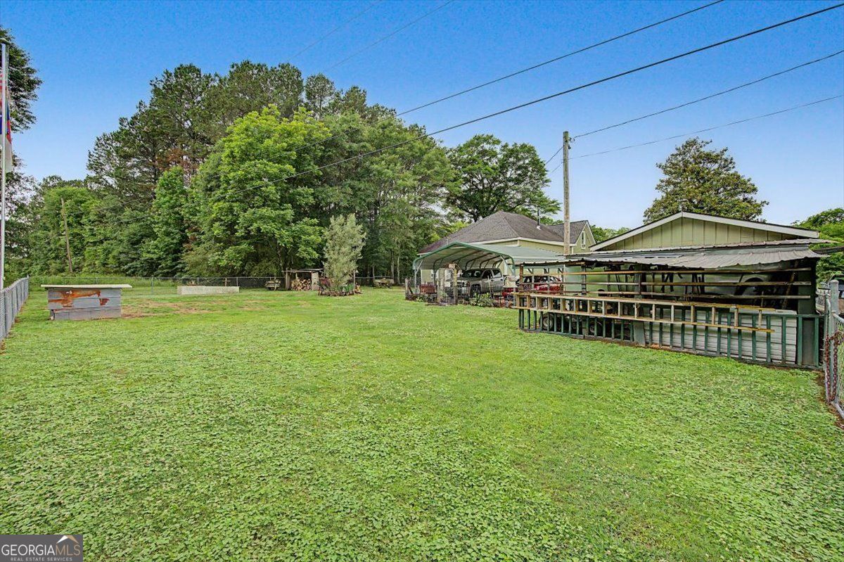 483 Coal Road Northwest Resaca, GA 30735 - Photo 45 of 56 a view of house with garden space and deck