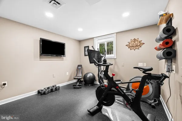 a view of a room with gym equipment