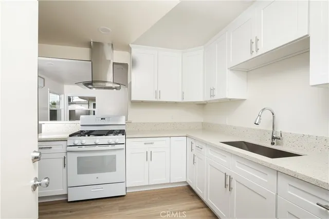 a view of a bathroom from a hallway