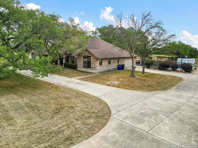 a house with yard in front of it