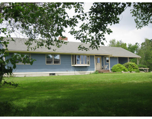 254 East County Road Rutland, MA 01543 - Photo 8 of 10 a front view of a house with a garden