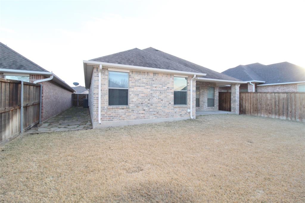 333 Blake Lane Midlothian, TX 76065 - Photo 24 of 25 front view of a house with a dry yard