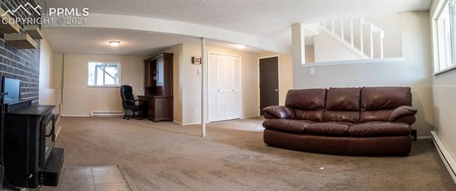 1315 Slocum Road Colorado Springs, CO 80930 - Photo 21 of 37 Lower Level w/ Walkout to Attached 2-Car Garage