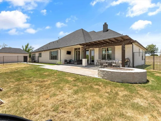 a front view of a house with swimming pool