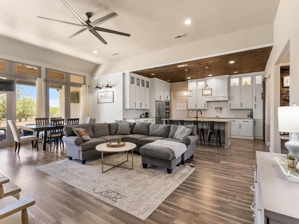 101 Trail Ridge Weatherford, TX 76087 - Photo 8 of 39 a living room with lots of furniture and view of kitchen