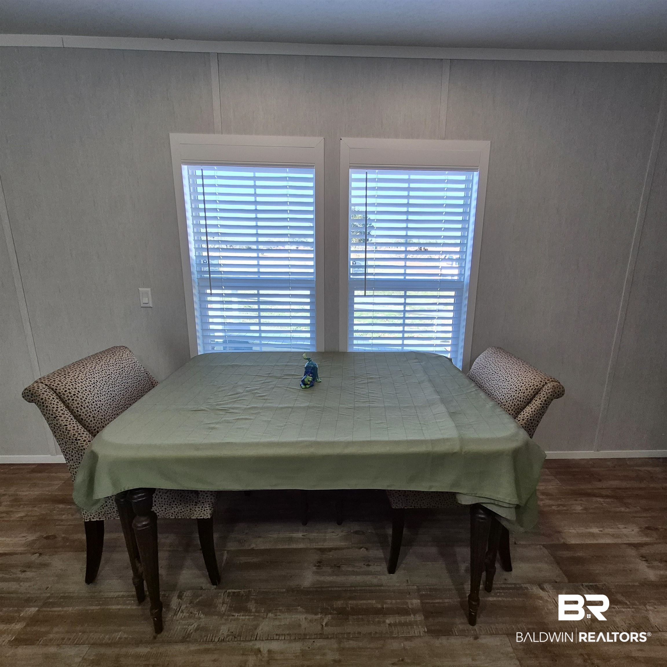 8867 Old Stage Road Repton, AL 36475 - Photo 14 of 37 Dining room featuring dark wood-style flooring and ornamental molding