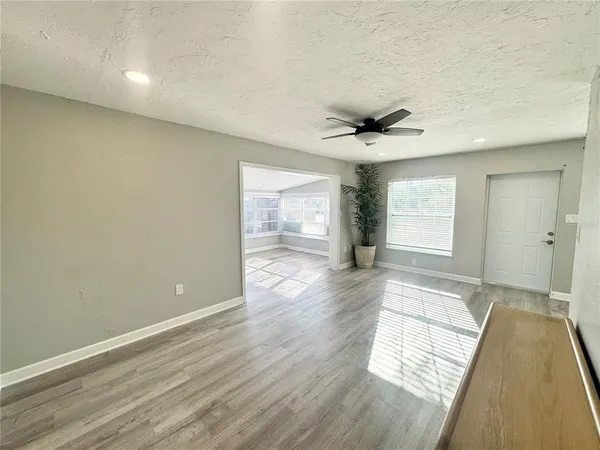 a kitchen with stainless steel appliances a refrigerator sink and stove