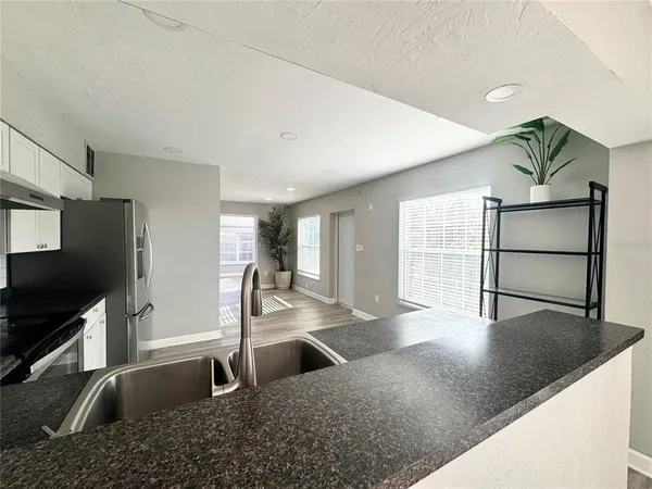 a view of an empty room and window