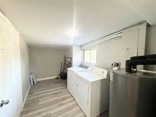 a bathroom with a toilet a sink and a bathtub