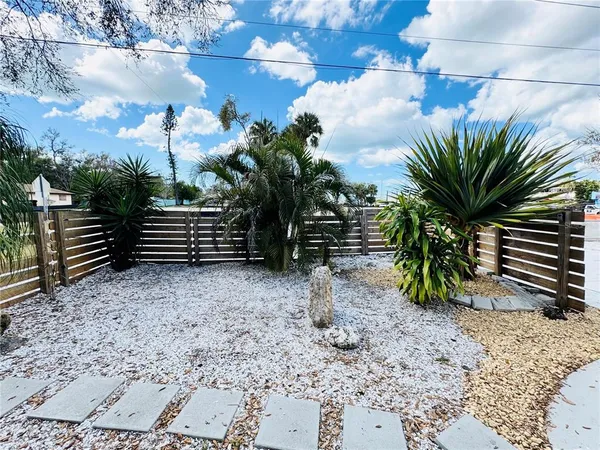 a view of livingroom with furniture and hardwood floor