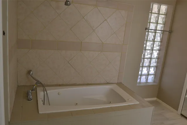 a bathroom with a bathtub