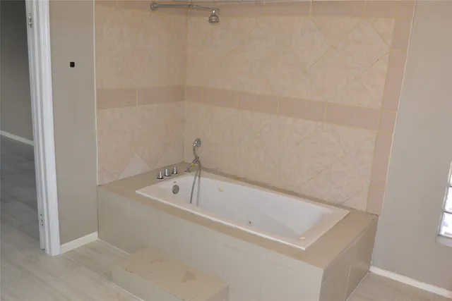 a bathroom with a bathtub