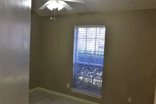 a view of entryway with a chandelier