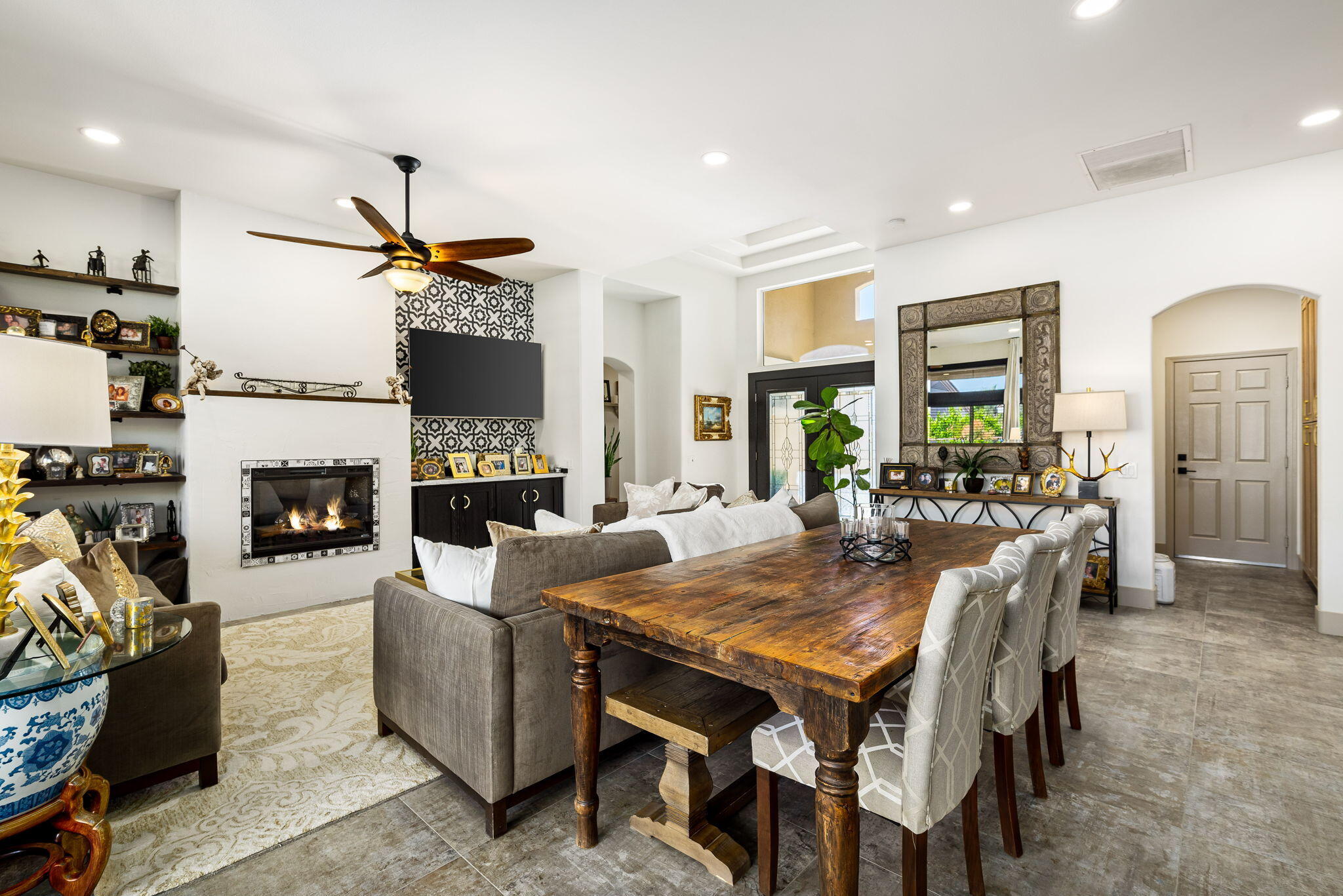 78618 Dancing Waters Road Palm Desert, CA 92211 - Photo 15 of 38 a view of a dining room with furniture window and wooden floor