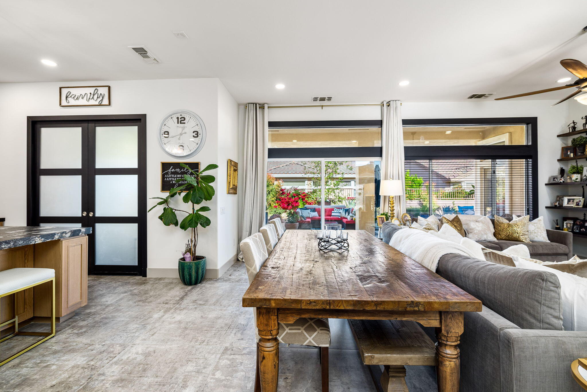 78618 Dancing Waters Road Palm Desert, CA 92211 - Photo 17 of 38 a view of a dining room with furniture window and wooden floor