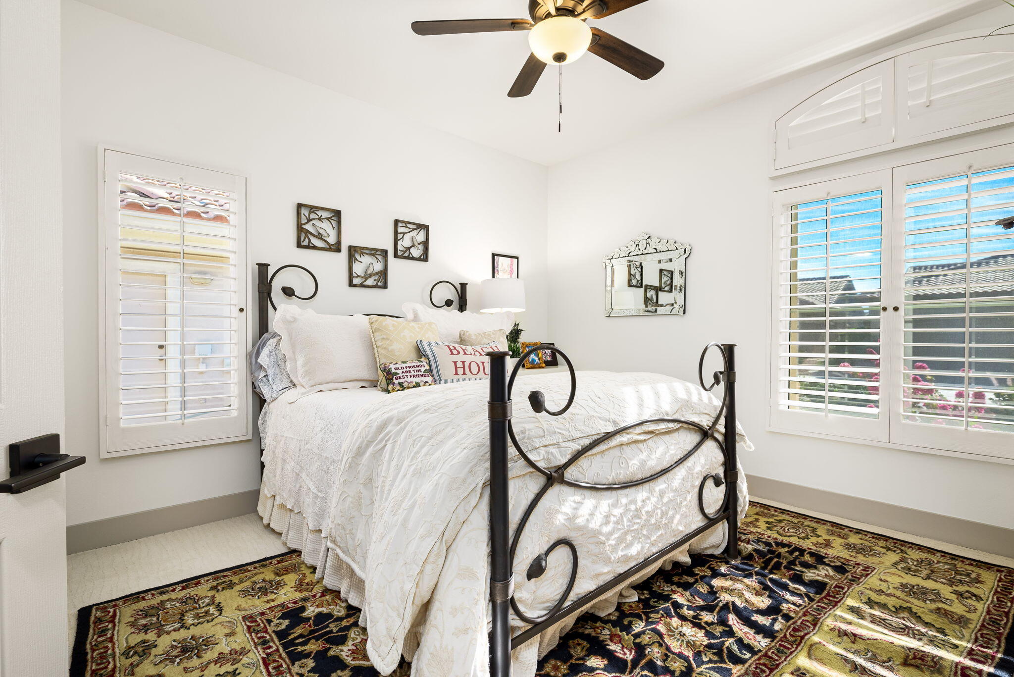 78618 Dancing Waters Road Palm Desert, CA 92211 - Photo 36 of 38 a bedroom with a bed and a window