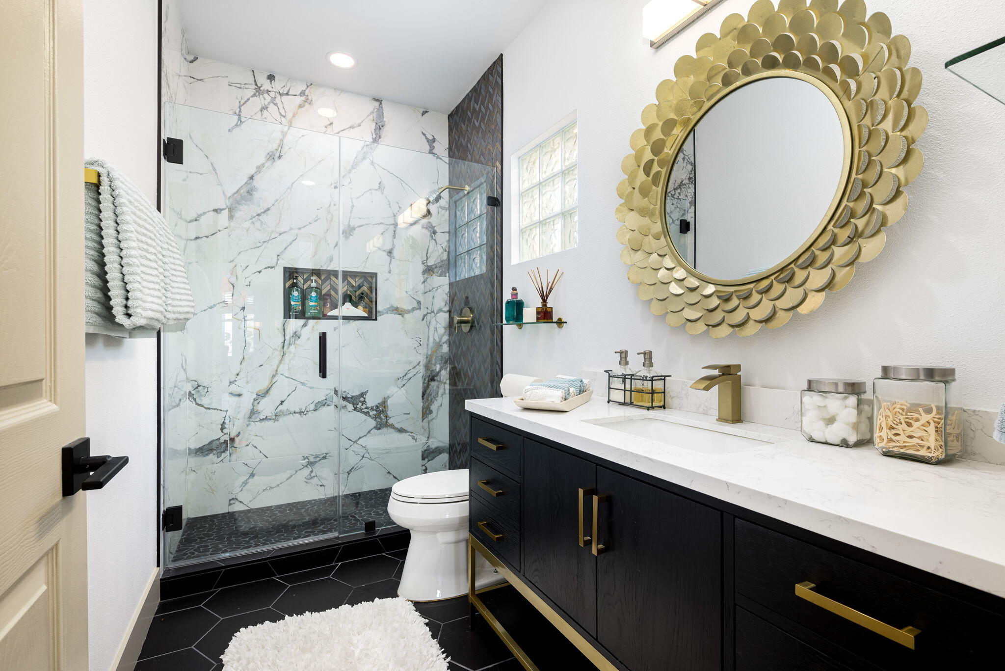 78618 Dancing Waters Road Palm Desert, CA 92211 - Photo 37 of 38 a bathroom with a granite countertop toilet a sink and a mirror