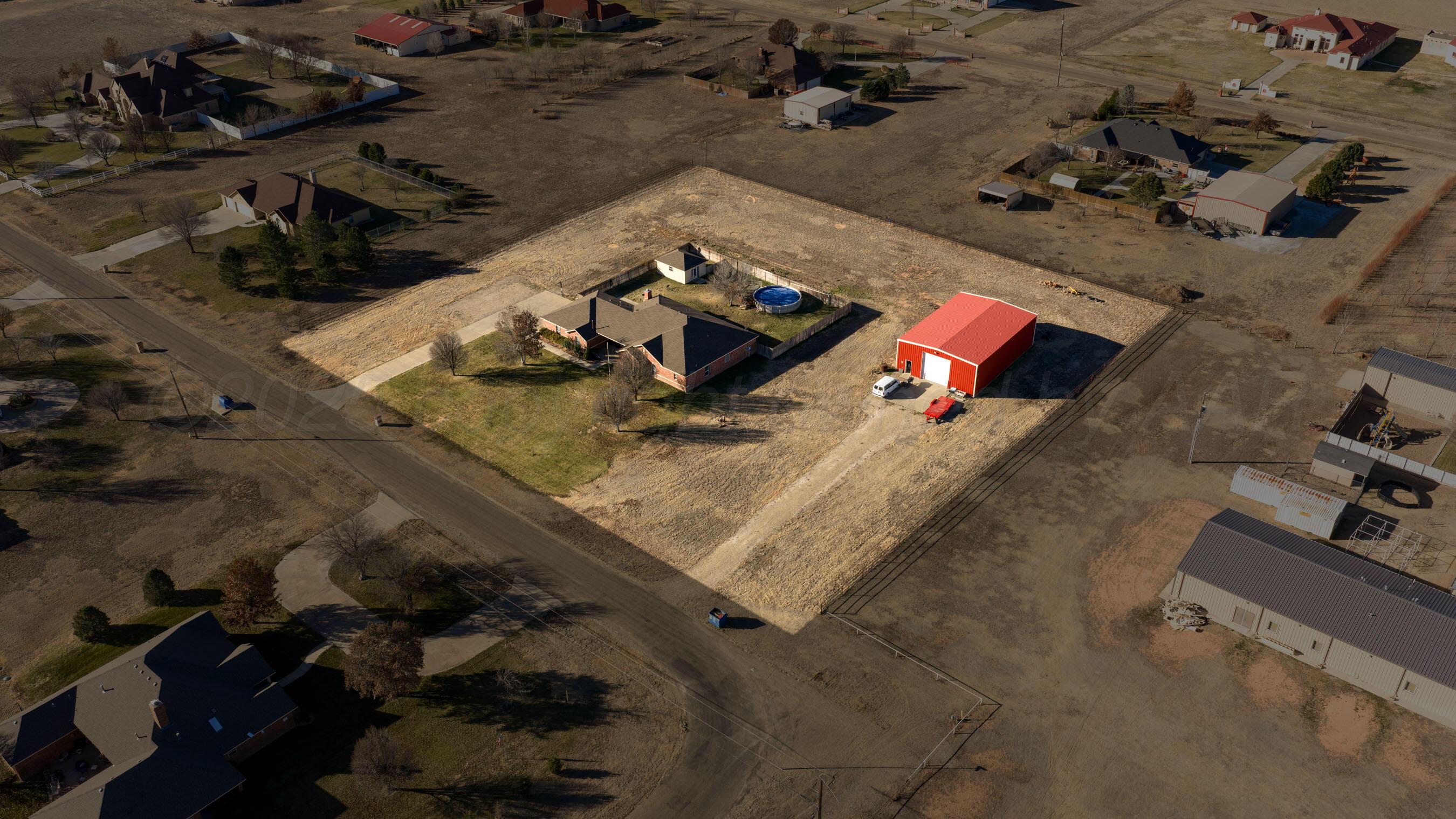 8900 Ottobahn Amarillo, TX 79119 - Photo 3 of 56 an aerial view of a house with a backyard