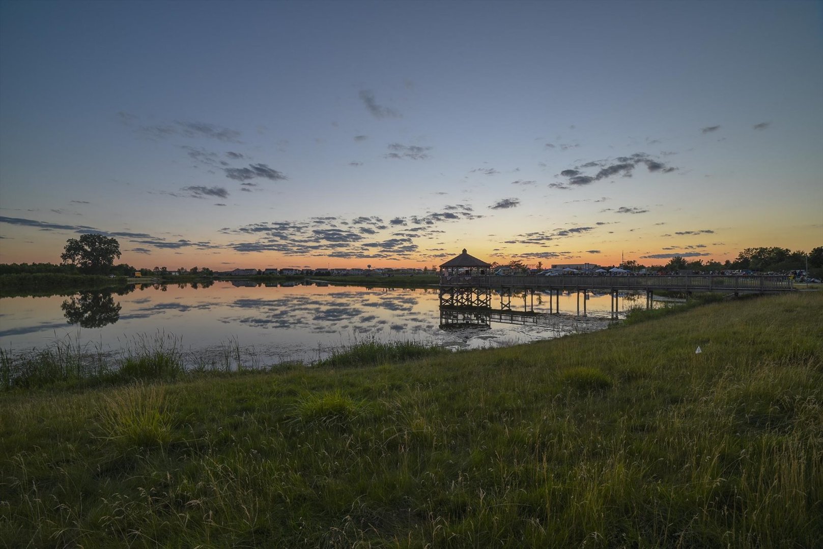 2451 Alison Avenue Pingree Grove, IL 60140 - Photo 28 of 47 a view of a lake with a big yard