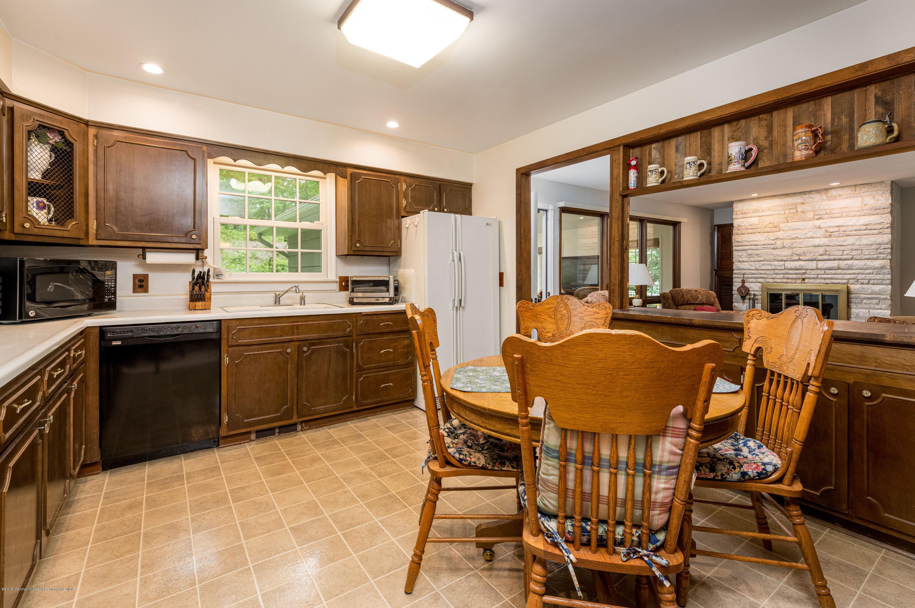 428 Brickyard Road Freehold, NJ 07728 - Photo 11 of 25 a view of a dining room with furniture and a window