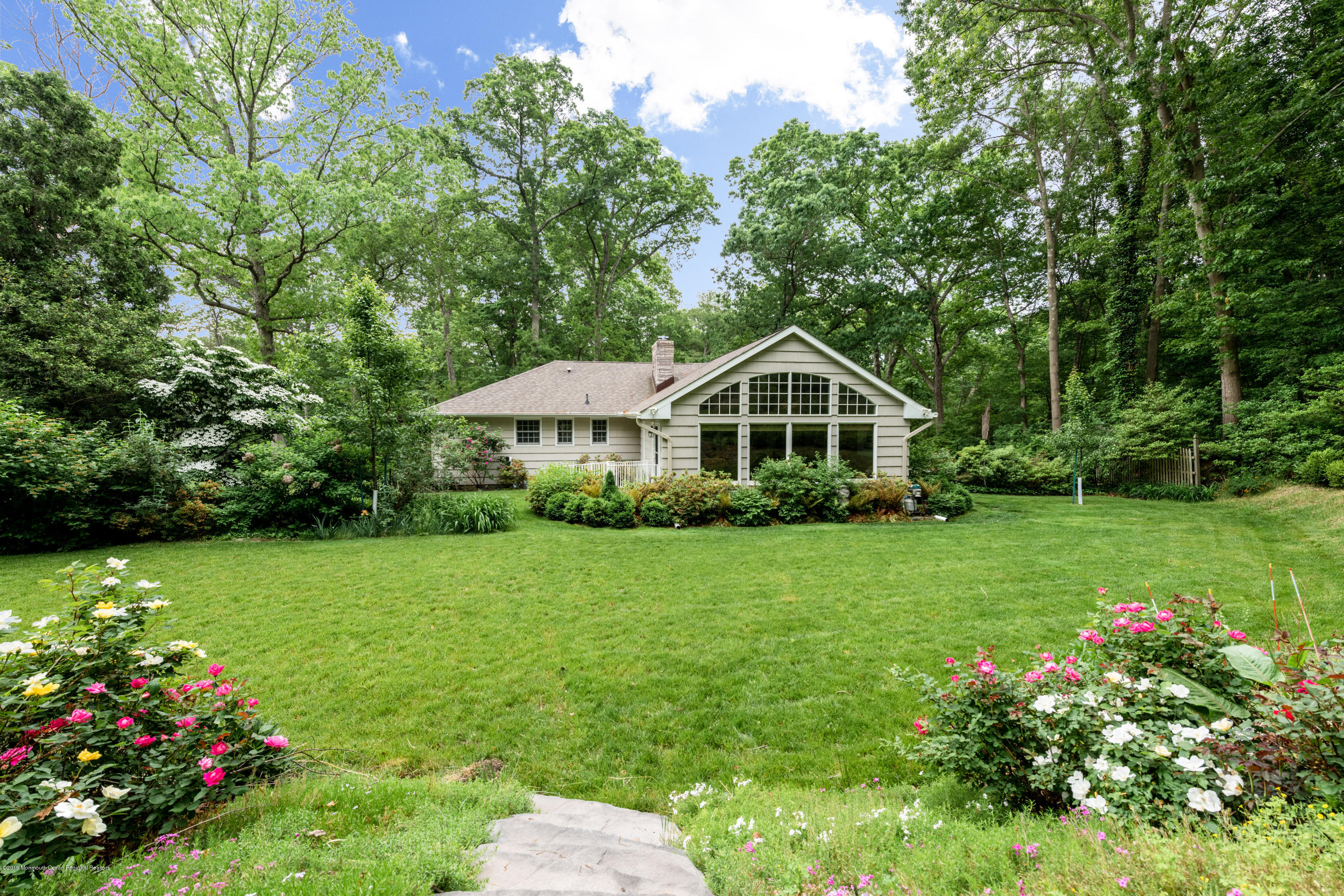 428 Brickyard Road Freehold, NJ 07728 - Photo 14 of 25 a front view of a house with garden