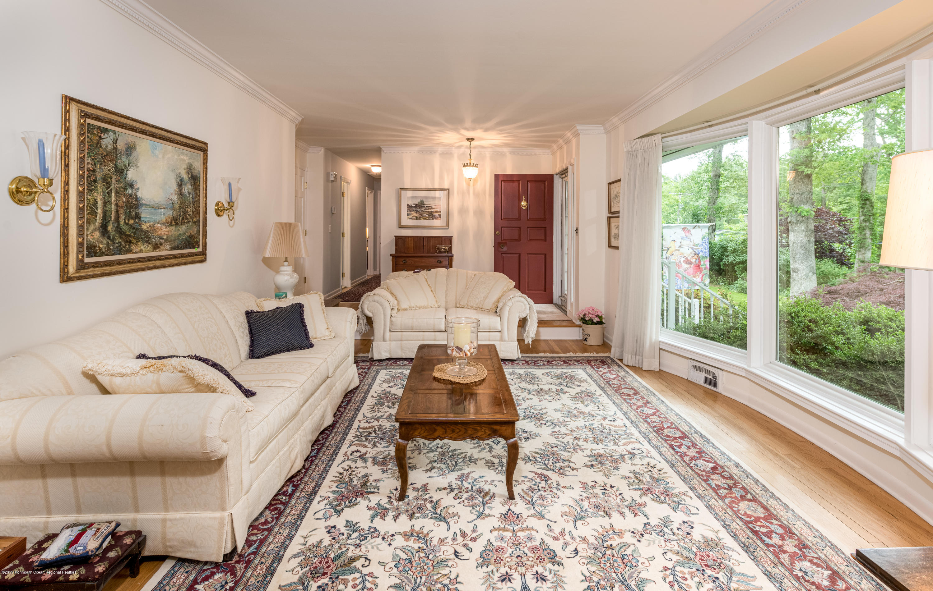 428 Brickyard Road Freehold, NJ 07728 - Photo 16 of 25 a living room with furniture and a large window