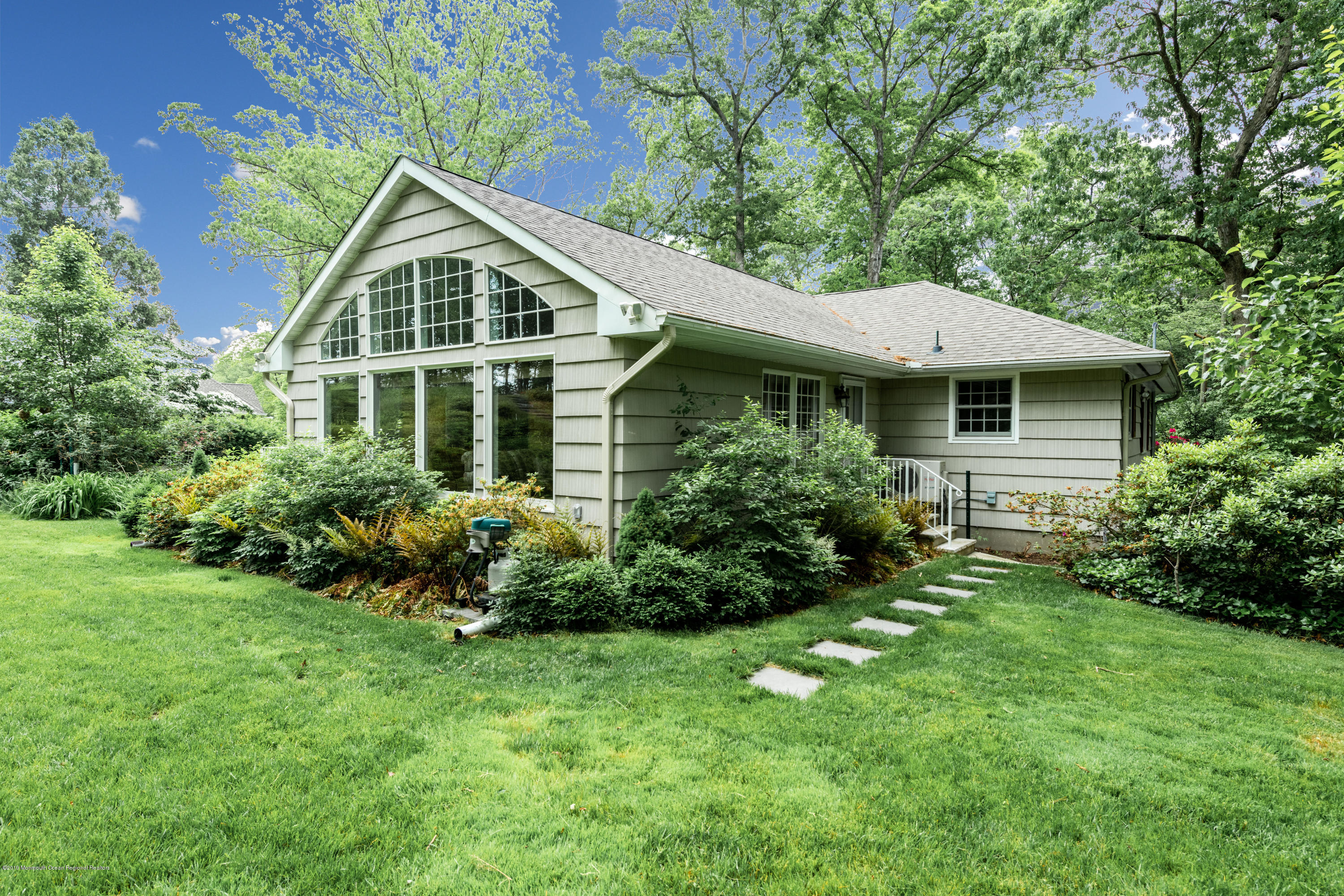 428 Brickyard Road Freehold, NJ 07728 - Photo 3 of 25 a front view of a house with a yard