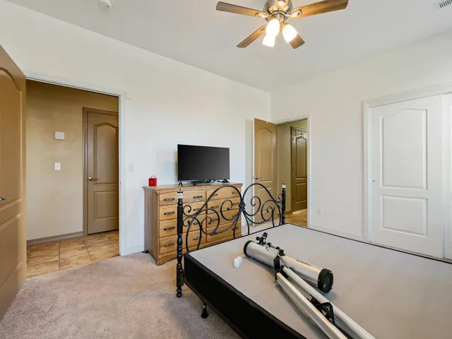 a room with furniture and flat screen tv