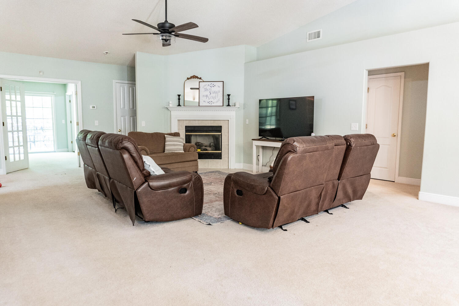 656 Territory Lane Crestview, FL 32536 - Photo 16 of 35 a living room with furniture and a fireplace