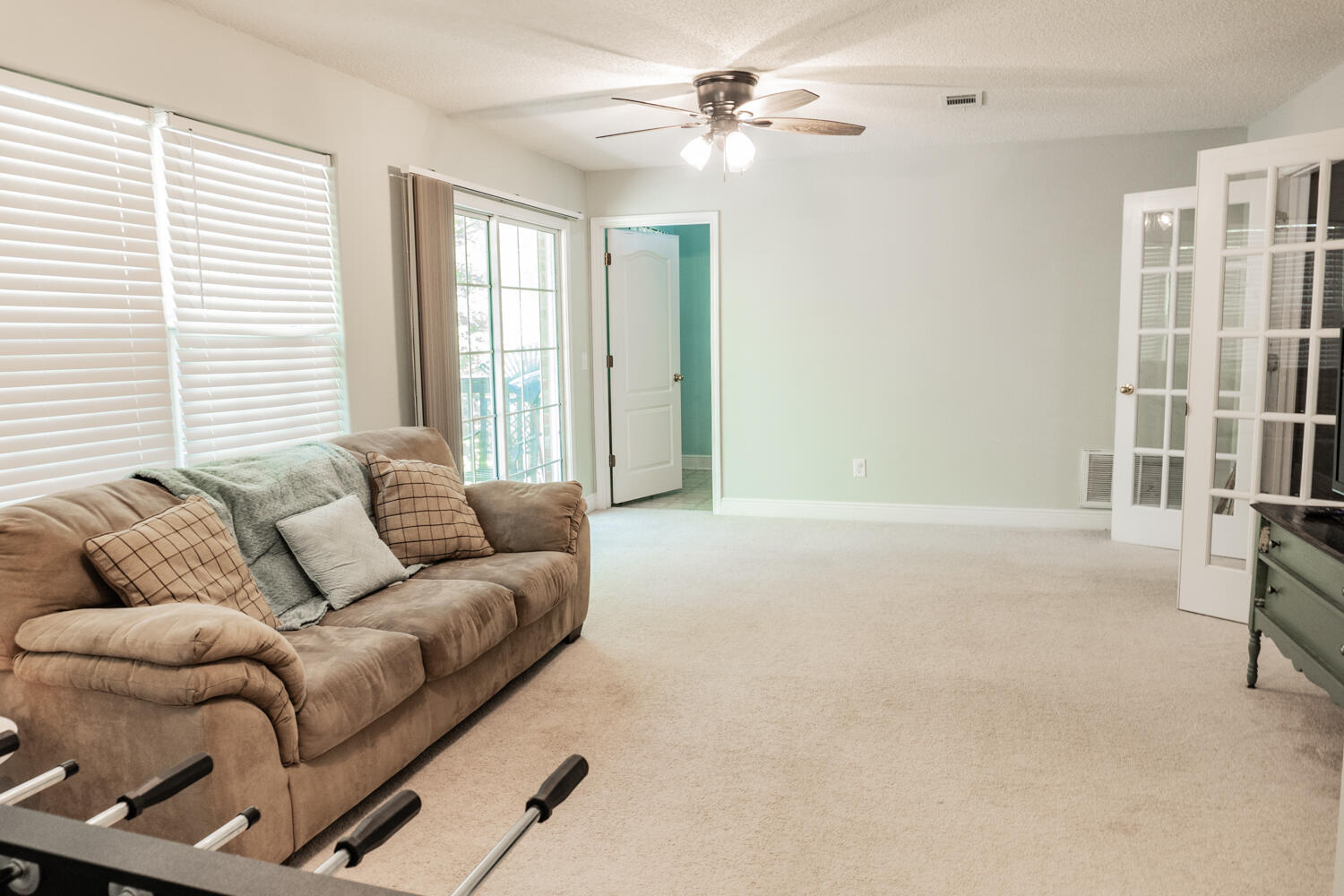 656 Territory Lane Crestview, FL 32536 - Photo 21 of 35 a living room with furniture and a window