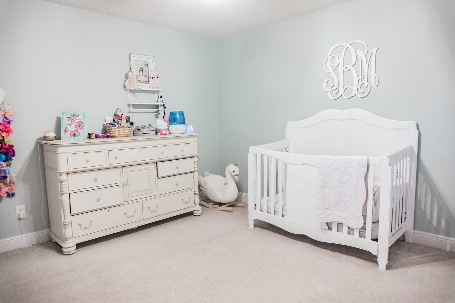 656 Territory Lane Crestview, FL 32536 - Photo 29 of 35 a room with a baby bed baby crib and a dresser