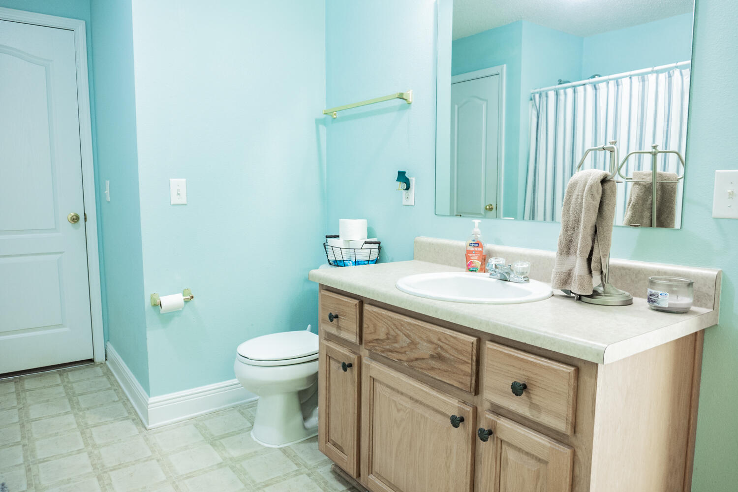 656 Territory Lane Crestview, FL 32536 - Photo 33 of 35 a bathroom with a granite countertop sink toilet and a mirror