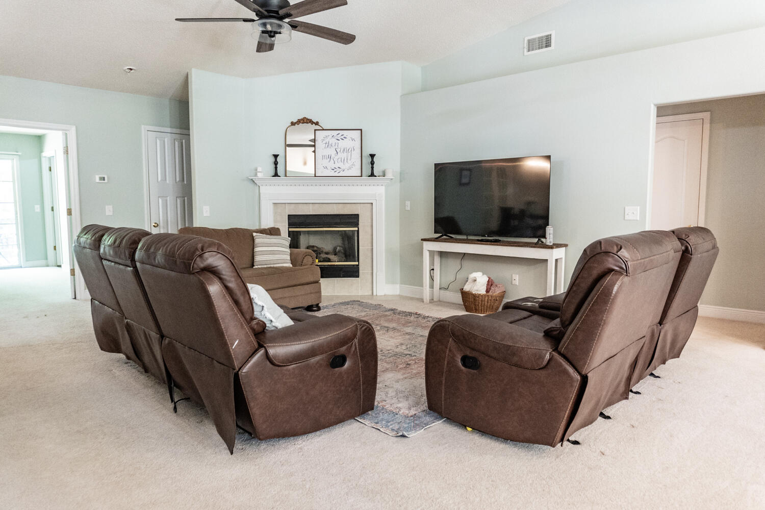 656 Territory Lane Crestview, FL 32536 - Photo 35 of 35 a living room with furniture a fireplace and a flat screen tv