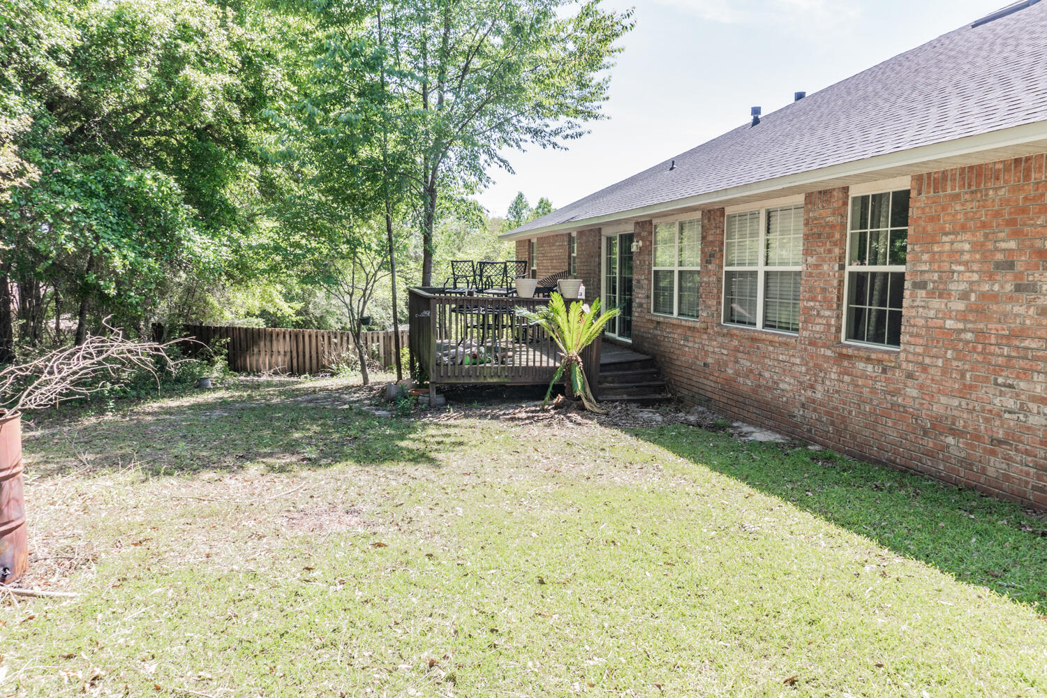 656 Territory Lane Crestview, FL 32536 - Photo 7 of 35 a backyard of a house with seating space