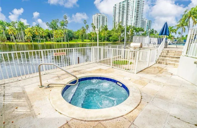 a view of a lake with building in front of it