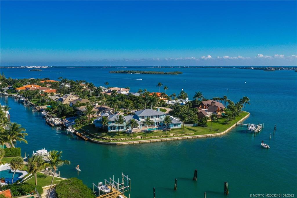 25 Island Road Stuart, FL 34996 - Photo 21 of 24 a view of a lake with a house
